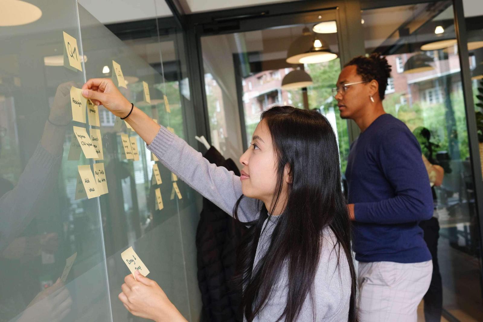 Woman using a Kanban board